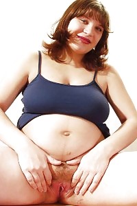 Passionate Ginger Spread Her Pregnant Stomach And Emptying Out Her Fuck Hole In This Amazing Fuck Pic