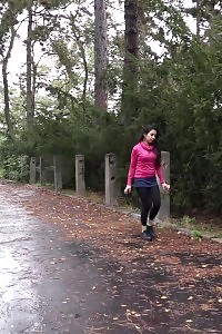 Black Haired Lass Squats To Piss On A Road