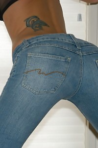 Tight Blue Jeans On Couch