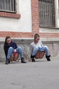 Brunette Ladies Piss In The City At Same Time