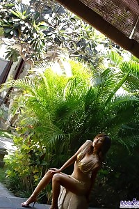 Asami Likes Stripping On The Plage And Flashing Her Nude Boobs And Bikini Clothed Butt