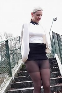 Blonde Secretary Squats To Pee While Outside