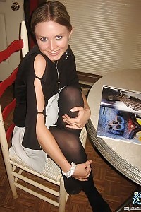 Kitty Cares Her Young Tanned Body In Black Panties And Sotckings