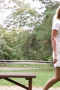 Excellent Blonde Pisses Outside On A Bench